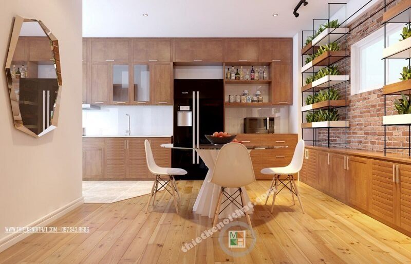 Mẫu thiết kế phòng ăn chung cư tiện nghi với bộ bàn ăn đơn giản nhỏ gọn kết hợp hệ tủ bếp gỗ công nghiệp cao cấp mang đến không gian phòng ăn lí tưởng