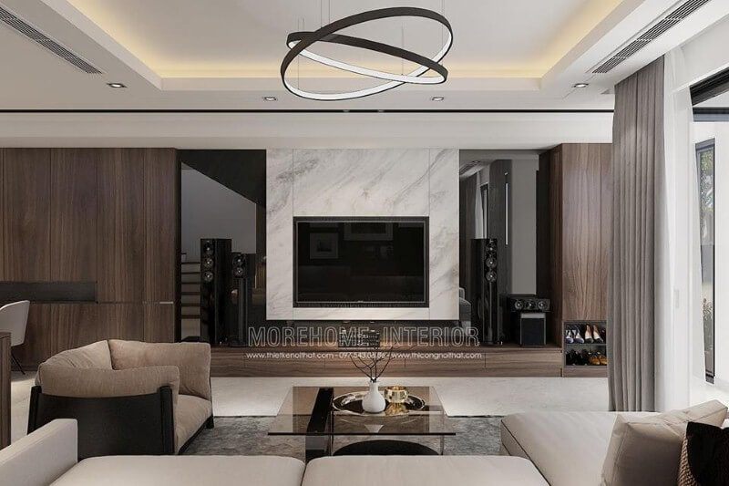 Đá marble được sử dụng để tạo ra một sự độc đáo khi kết hợp với vật liệu ốp phòng khách tối màu.